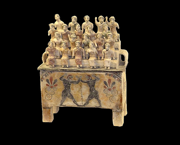 clay box of a wrestler